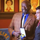 Les Payne is inducted into the New York Deadline Club’s Hall of Fame in November 2017. With him at the legendary Sardi’s Restaurant is Michael Arena, the club’s president and a former Newsday colleague. The club is the New York chapter of the Society of Professional Journalists. (Credit: Sarah Glover)